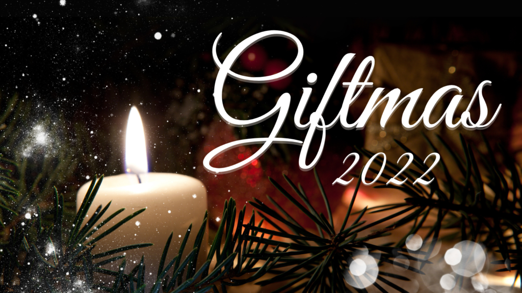 Lit candle surrounded by evergreen needles and the text 'Giftmas 2022'